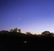 Silhouette Of A Castle On The Cliff Of A Mountain Wall Mural