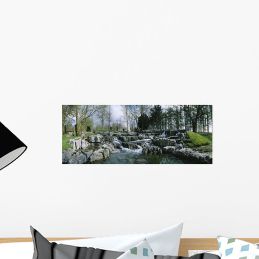 Water Flowing In A Garden Wall Mural