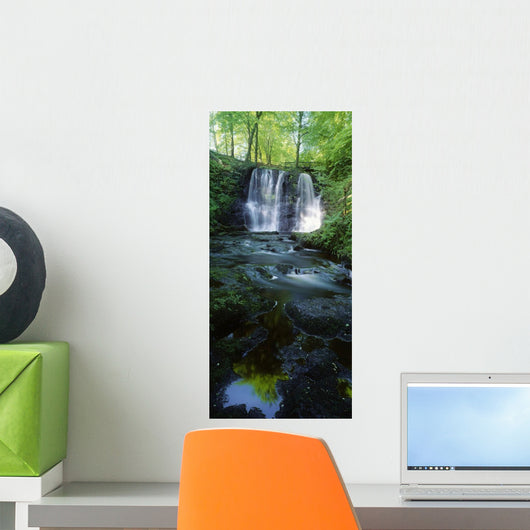 Low Angle View Of A Waterfall Wall Mural