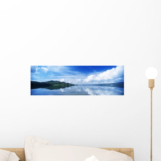 Reflection Of Clouds In Water Wall Mural