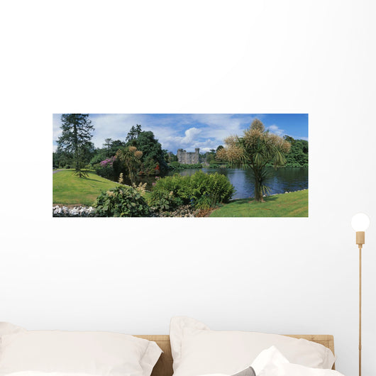 River In Front Of A Castle Wall Mural