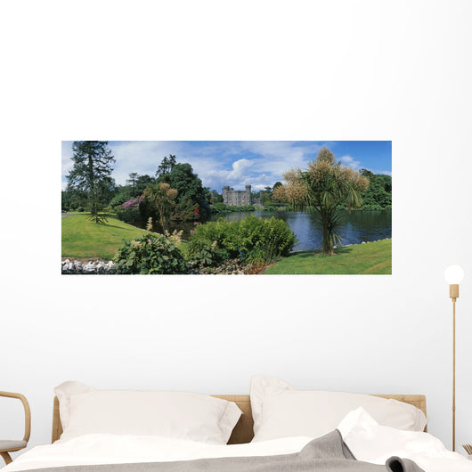 River In Front Of A Castle Wall Mural