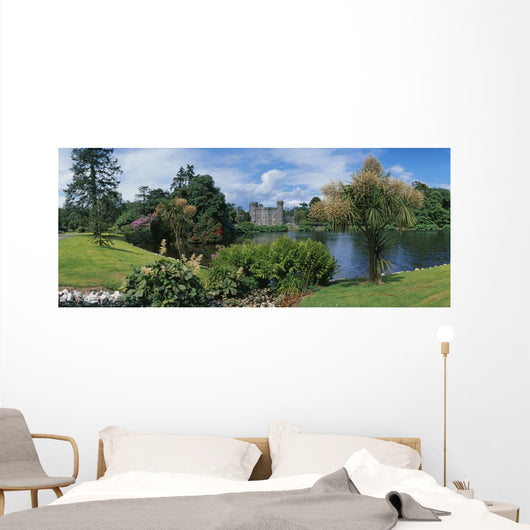 River In Front Of A Castle Wall Mural