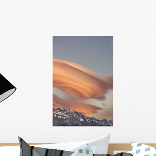 Clouds At Sunset Above Mountain Peaks Wall Mural