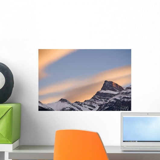Clouds At Sunset Above Mountain Peaks Wall Mural