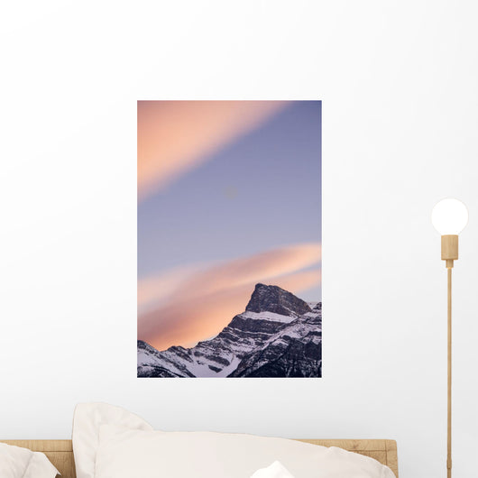Clouds At Sunset Above Mountain Peaks Wall Mural