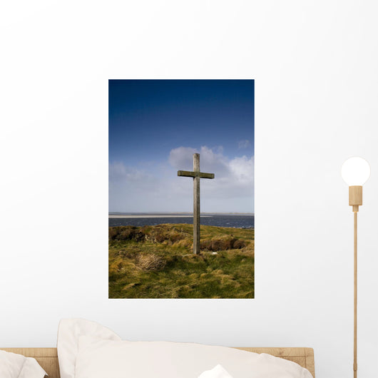 Grave Site Marked By A Cross On A Hill Wall Mural