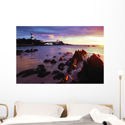 Sunset Over Beach With Lighthouse Wall Mural
