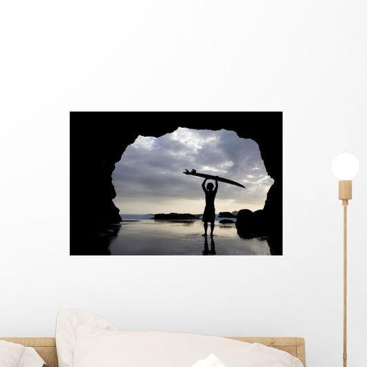 Surfer Inside A Cave At Muriwai North Island New Zealand Wall Mural