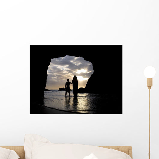 Surfer Inside A Cave At Muriwai New Zealand Wall Mural