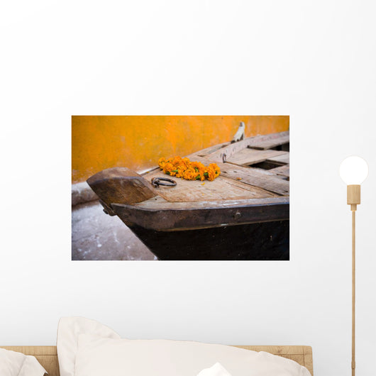 Flowers On Top Of Wooden Canoe Wall Mural