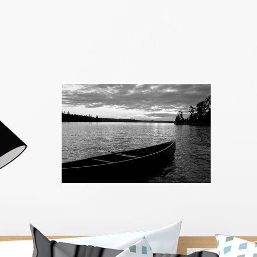 Abandoned Canoe Floating On Water Wall Mural