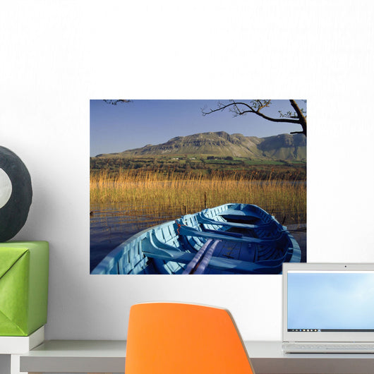 Row Boat Amongst Reeds On A Lake Wall Mural