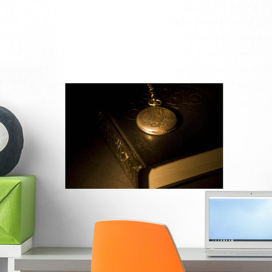 Gold Pocket Watch Resting On A Book Wall Mural