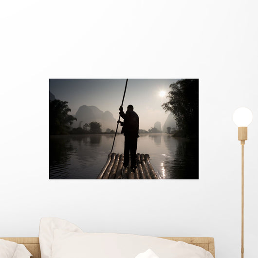 Man On Raft In Mountain Area Wall Mural