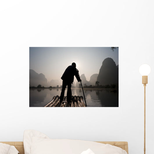 Man On Raft In Mountain Area Wall Mural