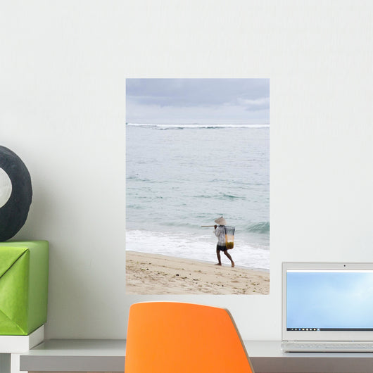 Person Walking On Beach With Fishing Net Wall Mural