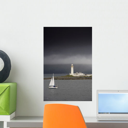 Sailboat Near A Shore With A Lighthouse Wall Mural