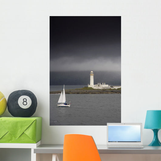 Sailboat Near A Shore With A Lighthouse Wall Mural
