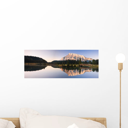 A Scenic Shot Of A Mountainside And Small Bridge Wall Mural