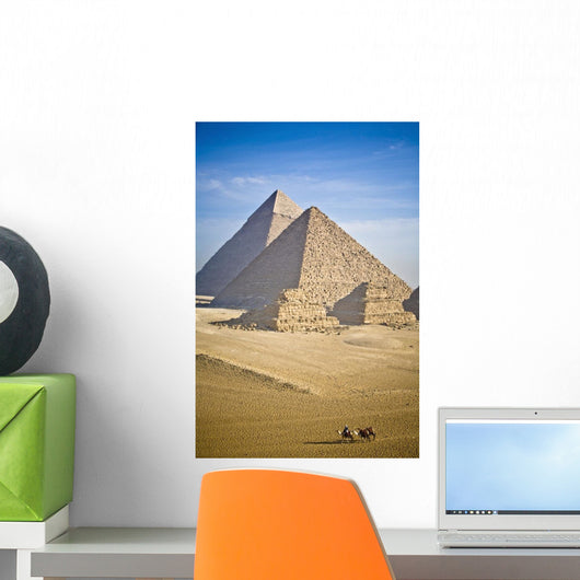 The Pyramids With Two Men On Camels Going By Wall Mural