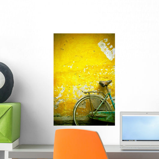A Bike Leaning Against A Wall Wall Mural