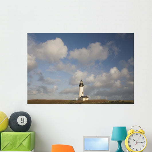 Lighthouse With Cloudy Backdrop Wall Mural