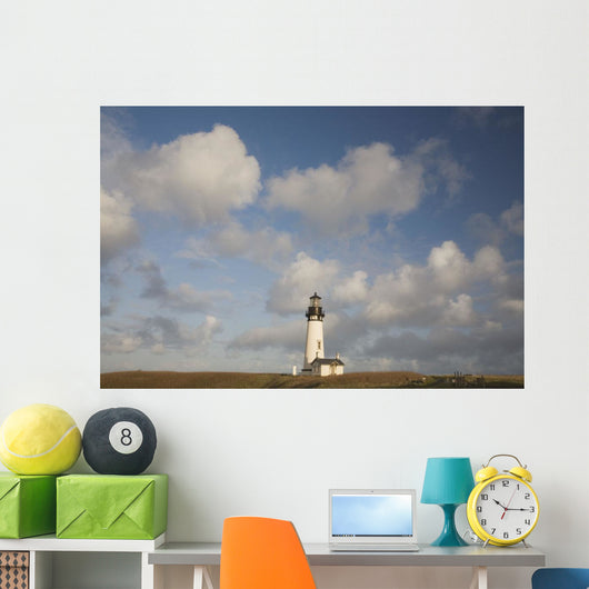Lighthouse With Cloudy Backdrop Wall Mural
