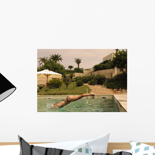 Woman Diving Into Swimming Pool Wall Mural