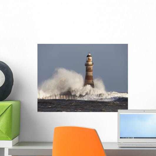 Waves Crashing Against A Lighthouse Wall Mural
