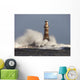 Waves Crashing Against A Lighthouse Wall Mural