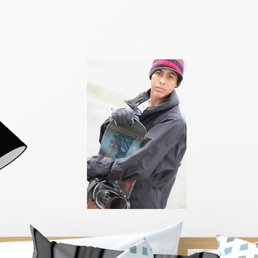 A Boy With A Snowboard Wall Mural