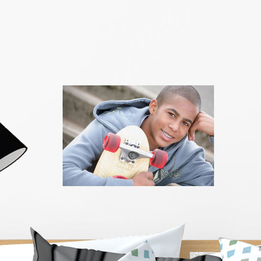A Boy With A Skateboard Wall Mural