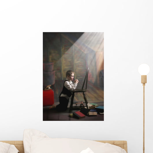 A Young Boy Praying With A Light Beam On Him Wall Mural