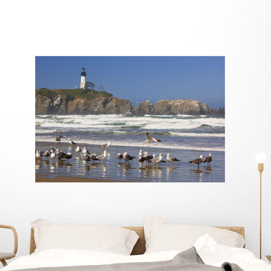 Seagulls On The Beach And Yaquina Head Lighthouse On The Oregon Coast Wall Mural