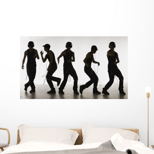 Composite Image Of A Boy Dancing With Headphones Wall Mural