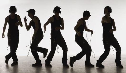 Composite Image Of A Boy Dancing With Headphones Wall Mural