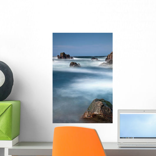 Mist Surrounding Large Rocks In The Water Wall Mural