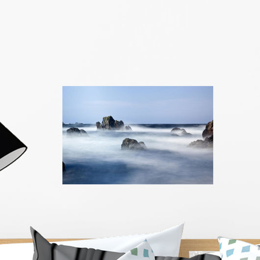 Mist Surrounding Big Rocks In The Water Wall Mural