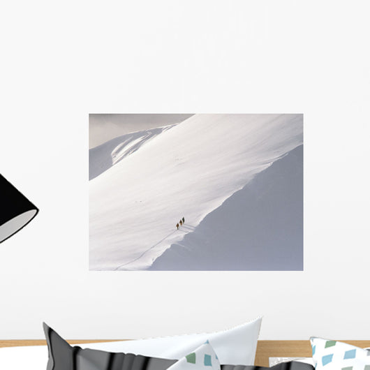 Trekking Up Snowy Mountain Wall Mural