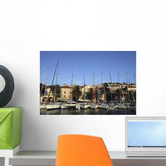 Sailboats Lined Up In Hvar Harbour Wall Mural