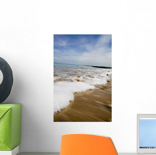 Sea Washing In Onto Sandy Beach Wall Mural