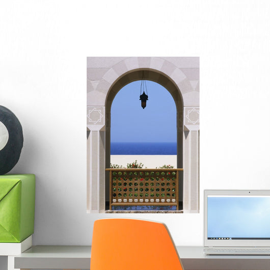 View Through Archway To Beach And Sea Wall Mural