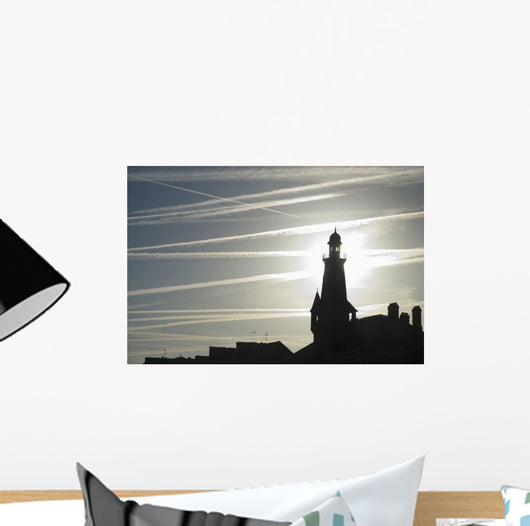 Airplane Contrails Above Lighthouse Wall Mural