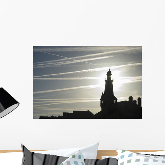 Airplane Contrails Above Lighthouse Wall Mural