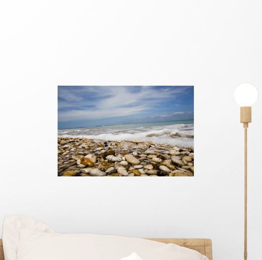 Sea Washing In Onto Sandy Beach Wall Mural