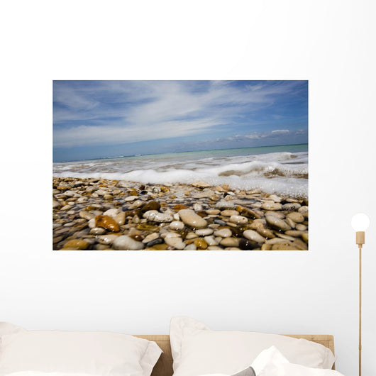 Sea Washing In Onto Sandy Beach Wall Mural