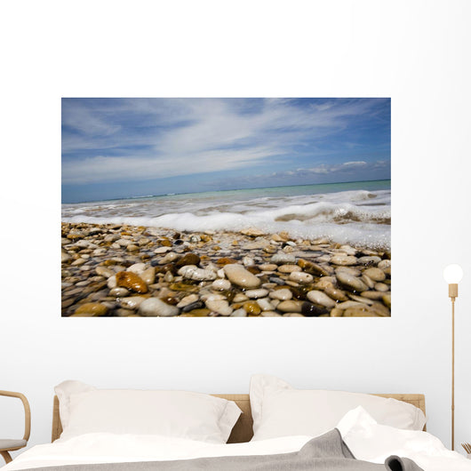 Sea Washing In Onto Sandy Beach Wall Mural