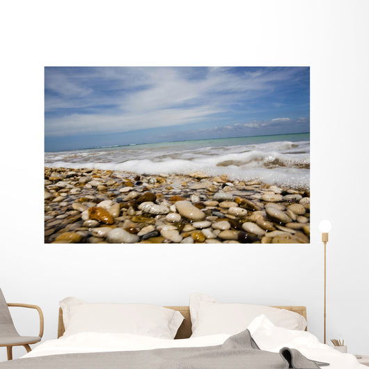 Sea Washing In Onto Sandy Beach Wall Mural