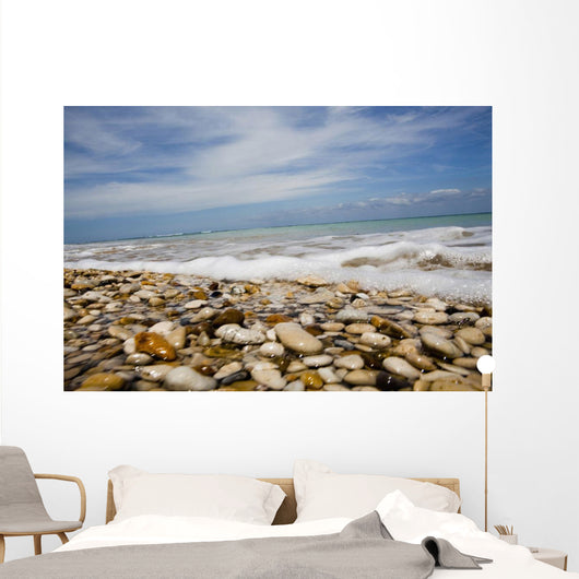 Sea Washing In Onto Sandy Beach Wall Mural